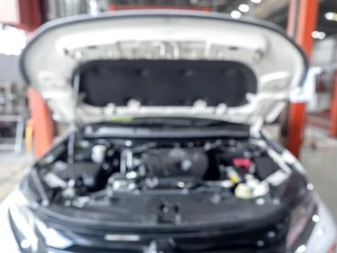 Abstract blur of engine inside bonnet hood car garage automobile interior b.. Stock Photos