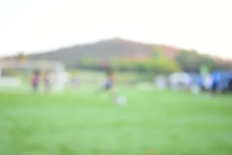 Abstract blur green grass in springtime, compettition season Foto stock