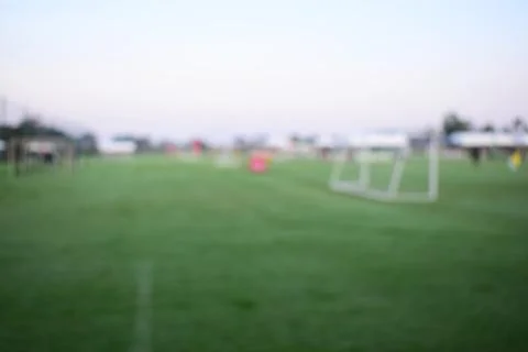 Abstract blur green grass in springtime, compettition season Foto stock