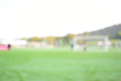 Abstract blur green grass in springtime, compettition season Stock Photos