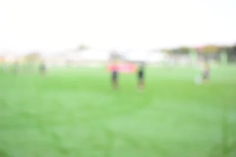 Abstract blur green grass in springtime, compettition season Stock Photos
