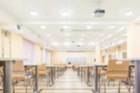 Abstract blur interior of empty University audiences. Modern school classroom Stock Photos