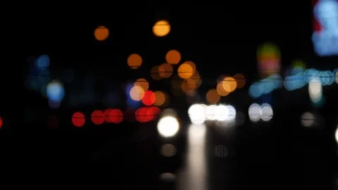 Abstract blur light bokeh of car driving in night city Stock Footage 89270179