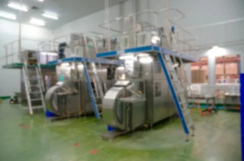 Abstract blur or Defocus Background of Milk sterilization Machine Stock Photos