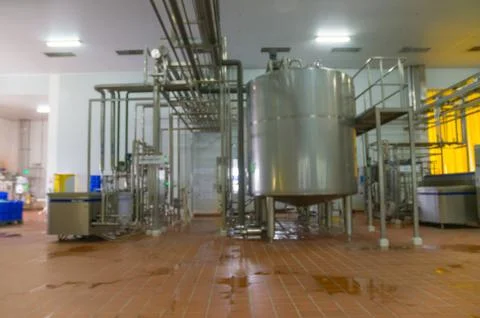 Abstract blur or Defocus Background of Milk Pasteurization Machine Stock Photos