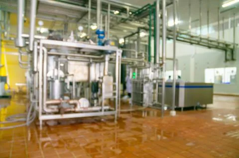 Abstract blur or Defocus Background of Milk Pasteurization Machine Stock Photos