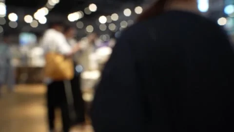 Abstract blur retails store interior for background. people walking in shoppi Stock Footage 309596267