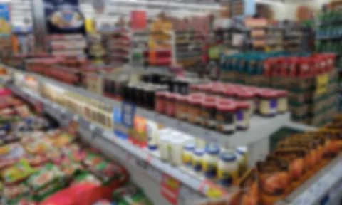 Abstract blur shelf in the supermarket for background Stock Photos