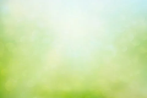 Abstract blur spring background. Green and blue bokeh Stock Photos