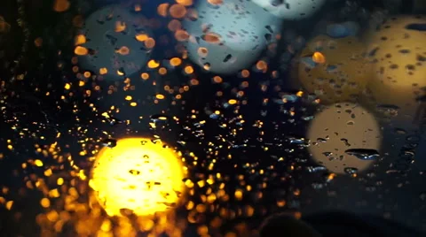 Abstract blur traffic lighting in the rain with bokeh Stock Footage 51210270