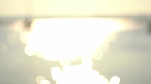 Abstract blurred background of the blurred sun glitters on the water surface. Stock Footage 157228267