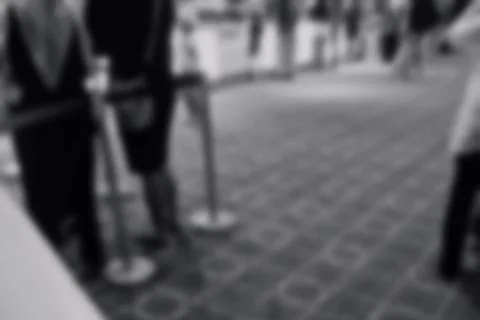 Abstract blurred background of a crowd queueing at a cinema 库存照片