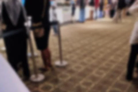 Abstract blurred background of a crowd queueing at a cinema 库存照片