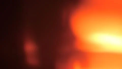 Abstract blurred background, with glowing orange, and dark brown, gradient .. Stock Photos