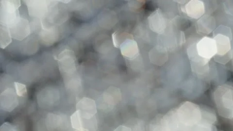 Abstract blurred background with hexagonal bokeh light reflections. Soft focus Stock Footage 303666779