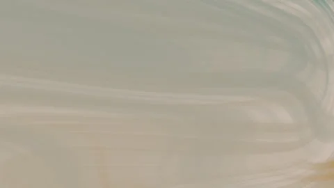 Abstract blurred background in light blue and beige tones ideal for presentation Stock Footage 325635193