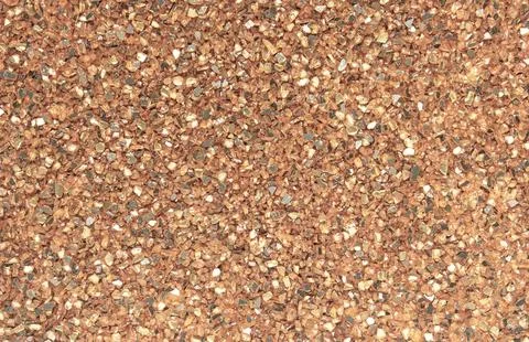 Abstract blurred background of small pebbles in orange and brown Stock-Fotos