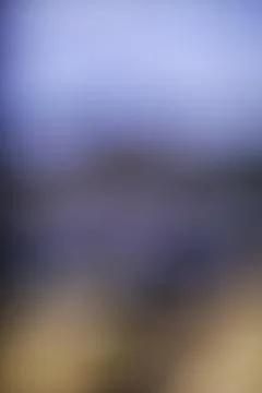 Abstract blurred background with soft blue and warm beige gradient color tr.. Stock Photos