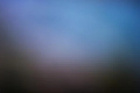 Abstract blurred background with soft blue and dark gradient transitions Stock Photos