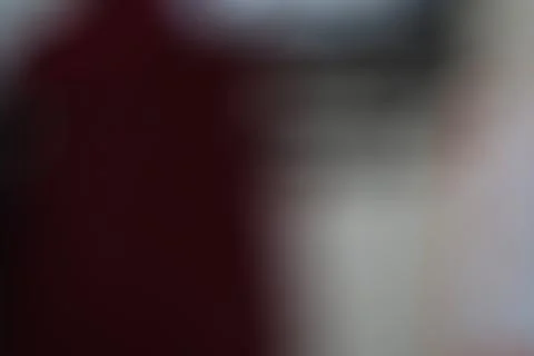 Abstract blurred background with soft gradient transitions in dark red and .. Stock Photos