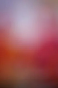 Abstract blurred background with soft gradient of red pink and purple light.. Stock Photos