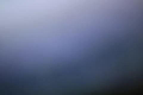 Abstract blurred background with soft gradient transition in dark blue tones Stock Photos