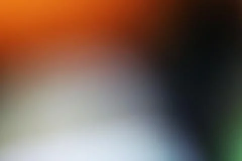 Abstract blurred background with soft gradient transition of orange and black Stock Photos