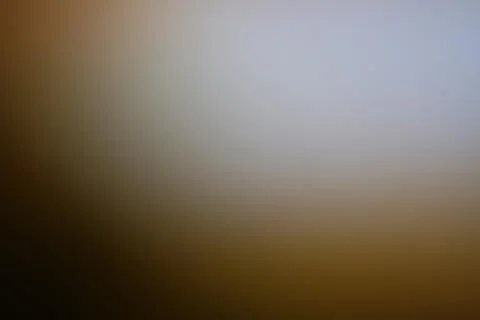 Abstract blurred background with soft gradient of brown and grey tones Stock Photos