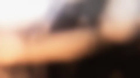 Abstract blurred background, with soft gradient, of white, orange, and black Stock Photos