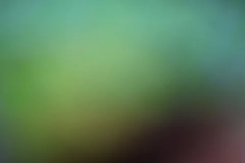Abstract blurred background with soft gradient of green and teal tones Stock Photos