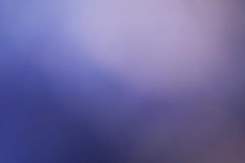Abstract blurred background with soft gradient transition in purple and blue Stock Photos