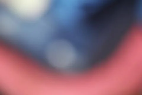 Abstract blurred background with soft gradients of blue and red light Stock Photos