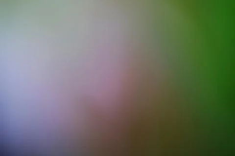 Abstract blurred background with soft gradients of green and purple light Stock Photos