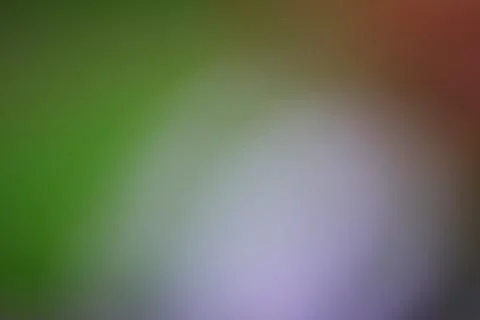 Abstract blurred background with soft green and purple gradient tones Stock Photos