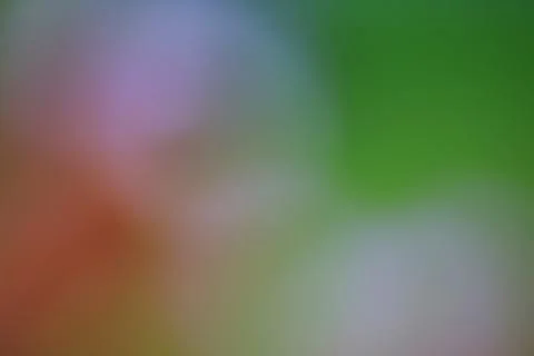 Abstract blurred background with soft green and orange gradient light Stock Photos