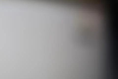 Abstract blurred background with soft grey and black gradient light texture. Stock Photos