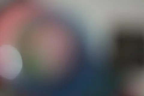 Abstract blurred background with soft light bokeh and smooth gradient color.. Stock Photos