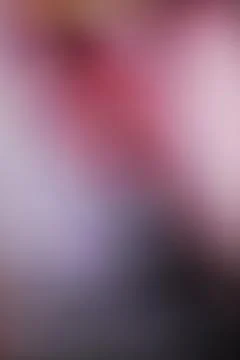 Abstract blurred background with soft pink and dark grey gradient tones Stock Photos