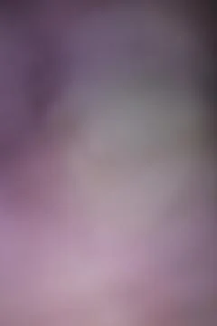 Abstract blurred background with soft purple and grey gradient tones Stock Photos