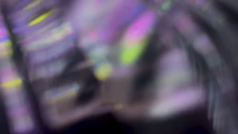 Abstract blurred background with vibrant light leaks and prismatic rainbow .. Video stock 344985539