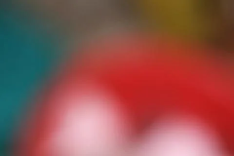Abstract blurred background with vibrant red and teal color gradients for d.. Stock Photos
