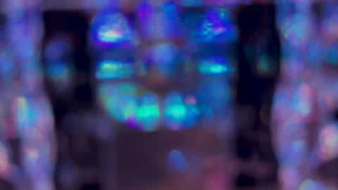 Abstract blurred background with vibrant teal and purple light bokeh Stock Footage 344985618