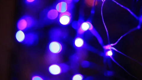 Abstract blurred of blue and silver glittering shine bulbs lights background Stock Footage 81385967