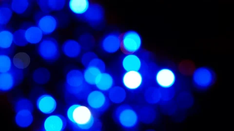 Abstract blurred blue lights on black background Stock Footage 145955344