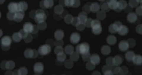 Abstract blurred bokeh circles on a black background Stock Footage 326170004