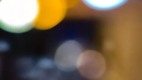 Abstract blurred bokeh lights background, colorful defocused night lights Foto stock