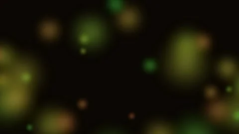 Abstract blurred bokeh lights shimmering on a deep dark black background Video stock 335117583