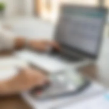 Abstract Blurred Close Up Background of Hands Using Calculator and Laptop Stock Photos