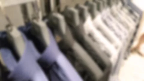 Abstract blurred clothes on hanger Stock Photos