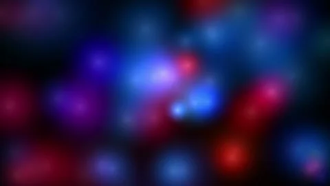 Abstract blurred colorful light bokeh particles floating on a dark black Stock Footage 346217979
